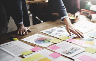 Photo of office staff prioritizing internal governance for their organization